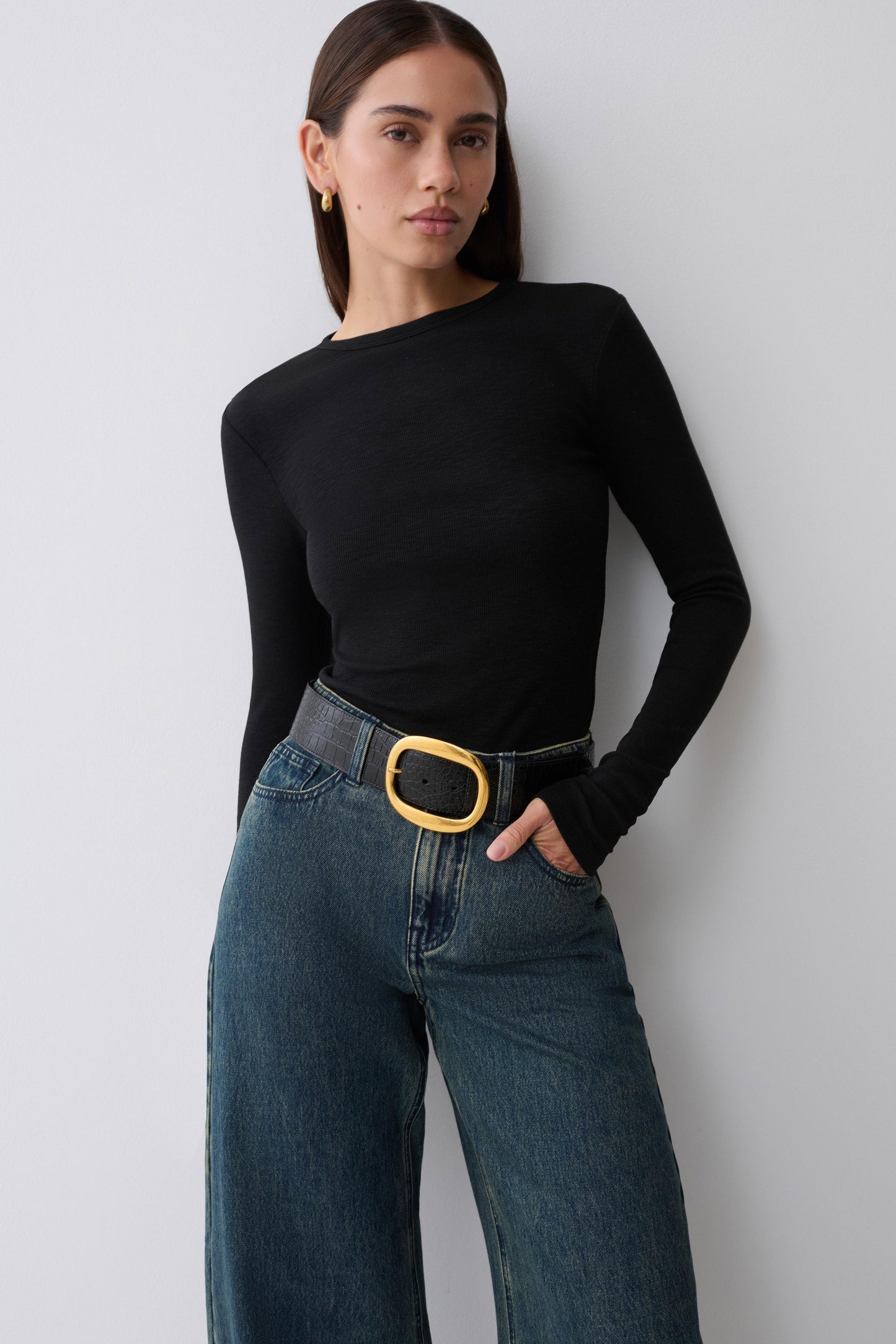 Woman wearing black long sleeve.