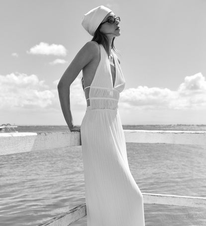 Woman in white maxi dress.