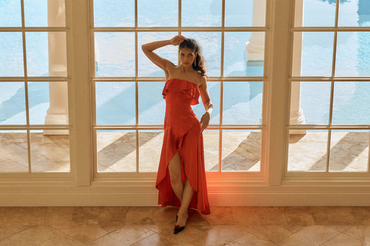 Image of red ruffle strapless midi dress