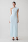 Woman wearing a light blue slinky axi dress with hardware.