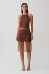 Woman wearing a brown sheer halter midi dress.