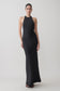 Woman wearing a black satin halter maxi dress.
