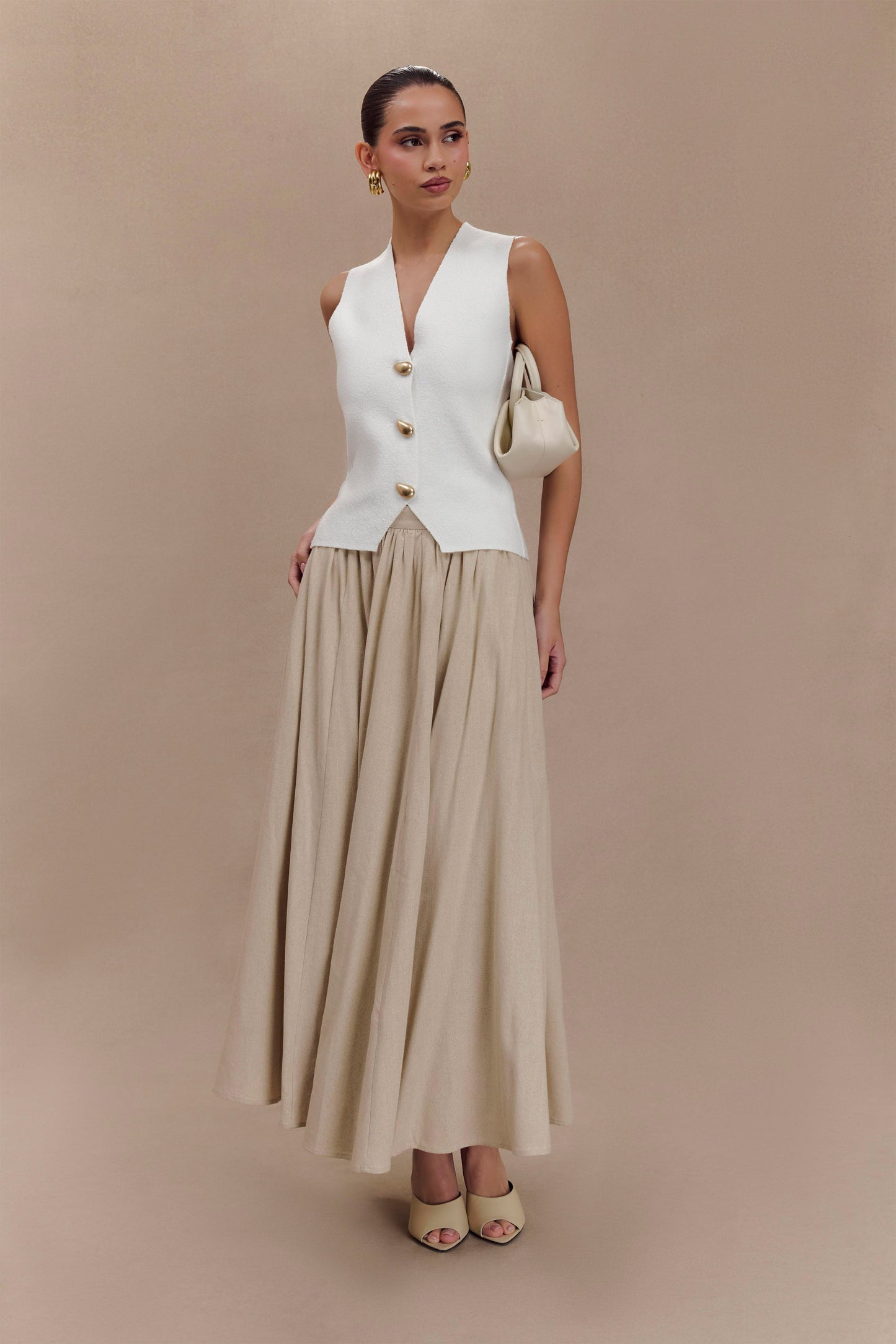 Malika Sleeveless Gold Button Vest - White