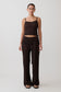 Woman wearing a brown boucle sleeveless top and matching wide-leg pants.