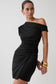 Woman wearing a black off-shoulder mini dress.