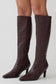 Brown knee-high boots with a textured pattern.