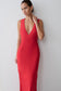 Woman wearing a red dress.