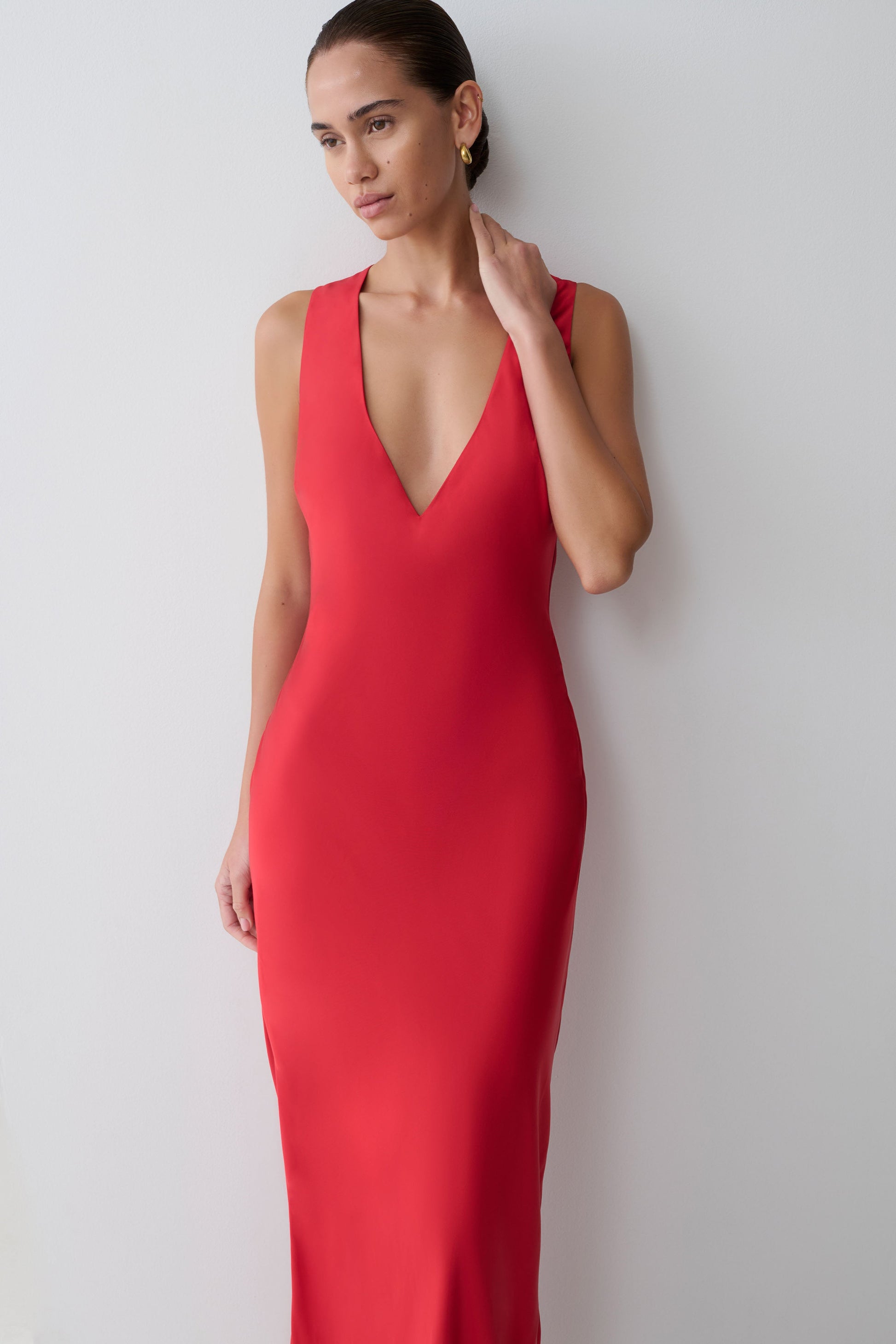 Woman wearing a red dress.