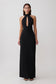 Woman wearing black stretch crepe maxi dress.