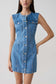 Woman wearing button front denim mini dress.