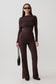 Woman wearing a brown modal straight leg overlay pant with matching top.