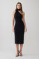 Woman wearing a black one shoulder tie midi dress.