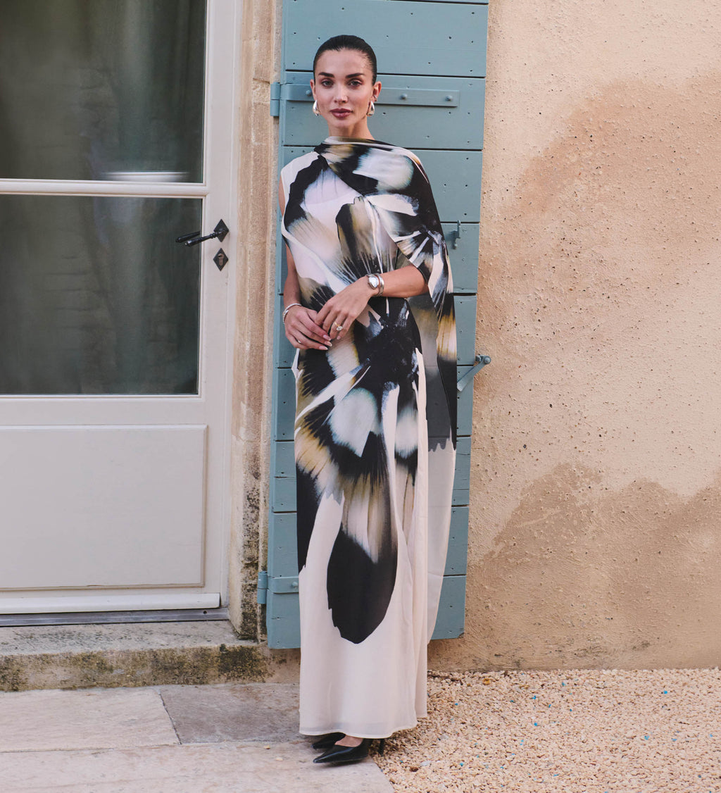Image of woman in floral print dress.
