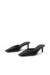 A pair of black pointed-toe mule heels with slim kitten heels, shown from a three-quarters angle on a clean white background.