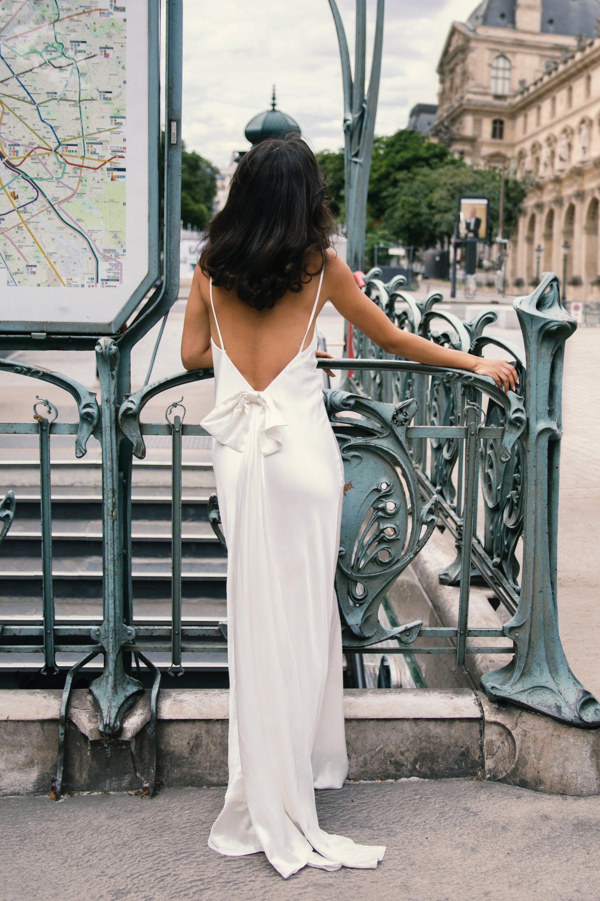 Kailey Low Back Maxi Dress With Bow Train - White | MESHKI UK Kailey Low Back Maxi Dress With Bow Train - White | MESHKI UK