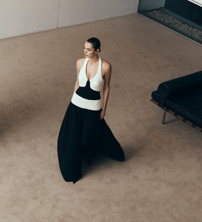 Woman in a black and white dress.