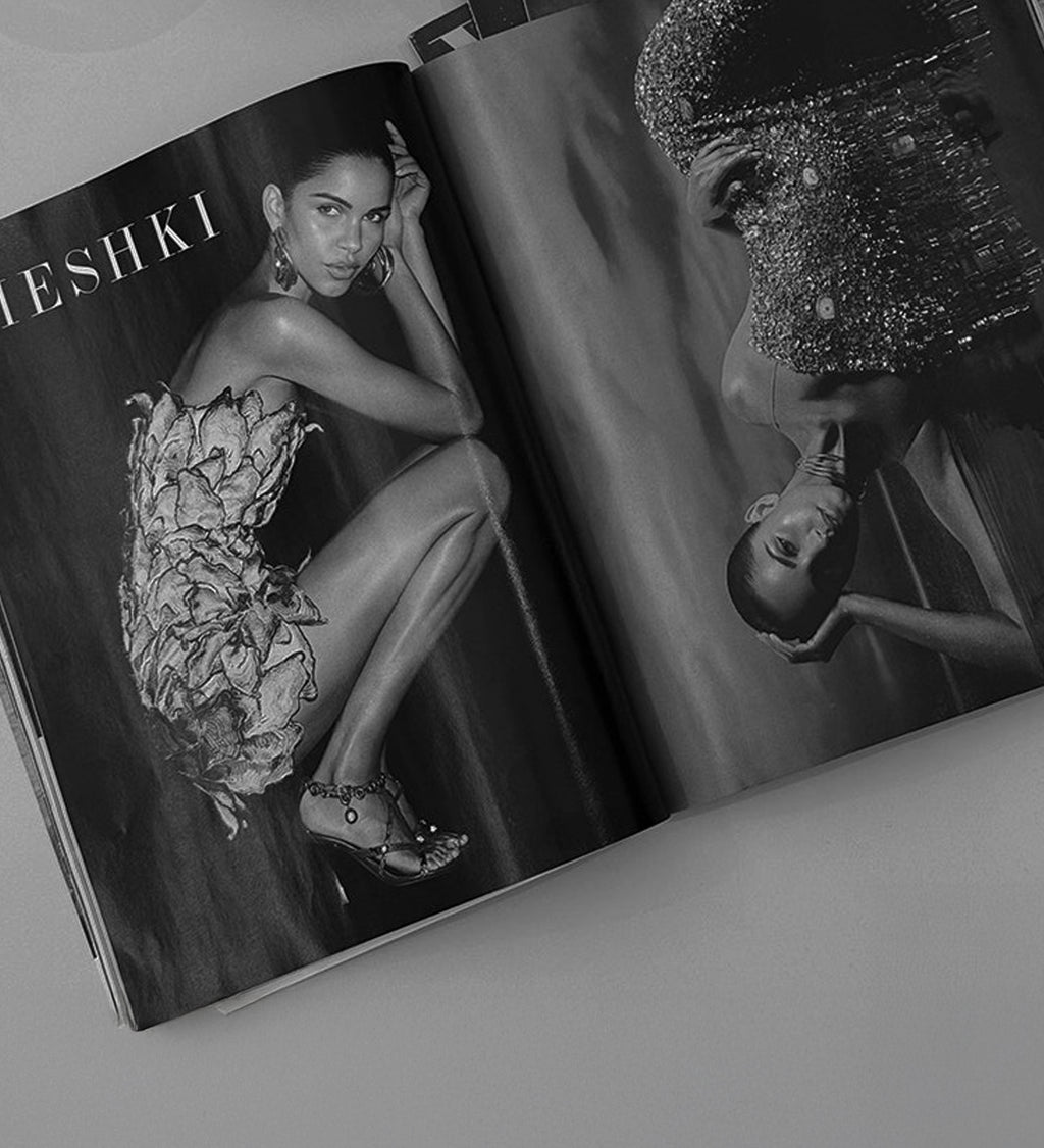 Open magazine showing a model in a floral dress with 'Teshki' branding.