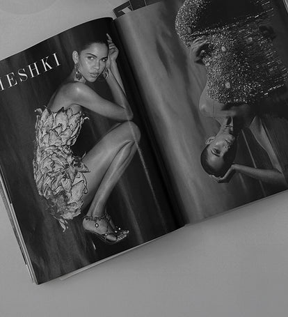 Open magazine showing a model in a floral dress with 'Teshki' branding.